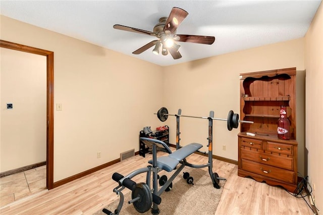2501 Olde Creek Ct S, Leavenworth, KS 66048 - workout room with light wood-type flooring and ceiling fan