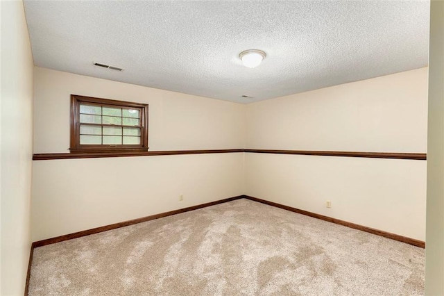 2501 Olde Creek Ct S, Leavenworth, KS 66048 - carpeted empty room featuring baseboards and a textured ceiling
