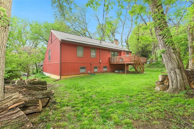 2501 Olde Creek Ct S, Leavenworth, KS 66048 - rear view of house with stairs, a deck, a lawn, and a chimney