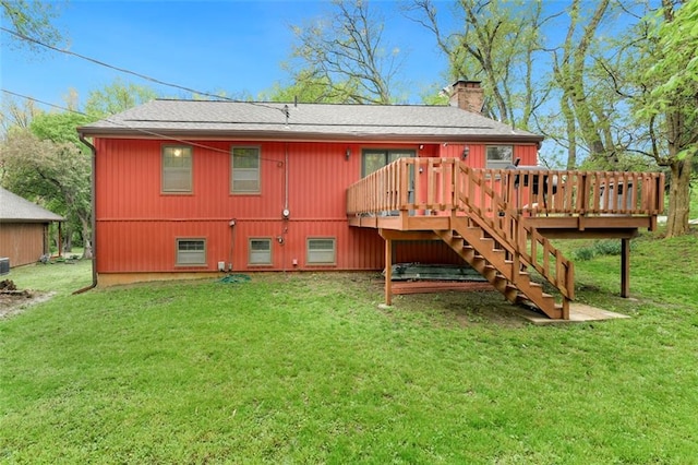2501 Olde Creek Ct S, Leavenworth, KS 66048 - back of house featuring a lawn, a wooden deck, stairs, a chimney, and a shingled roof