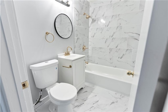 bathroom featuring marble finish floor, toilet, vanity, and tub / shower combination