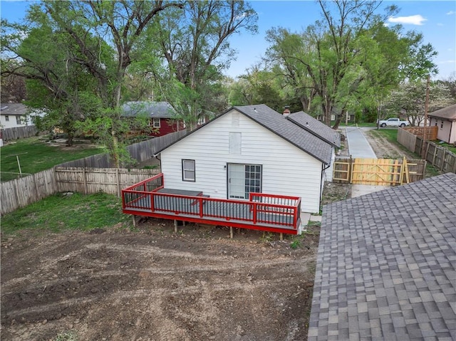 view of outbuilding featuring a fenced backyard