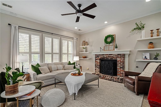 living room with plenty of natural light, ceiling fan, recessed lighting, and visible vents
