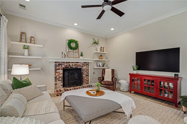 tiled living room with ceiling fan, a fireplace, recessed lighting, visible vents, and ornamental molding