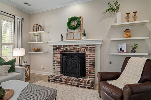 tiled living room featuring baseboards, ornamental molding, a brick fireplace, and visible vents