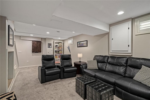 living room with recessed lighting, baseboards, and light carpet