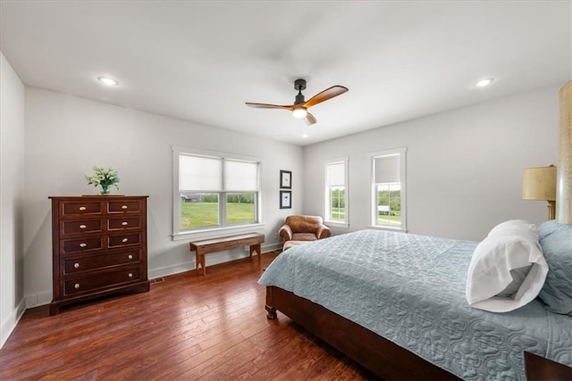 bedroom featuring dark wood-style flooring, baseboards, a ceiling fan, and recessed lighting