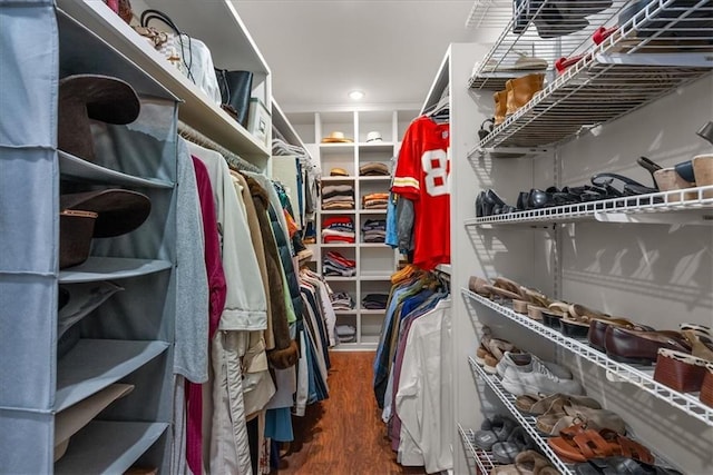 spacious closet with wood finished floors