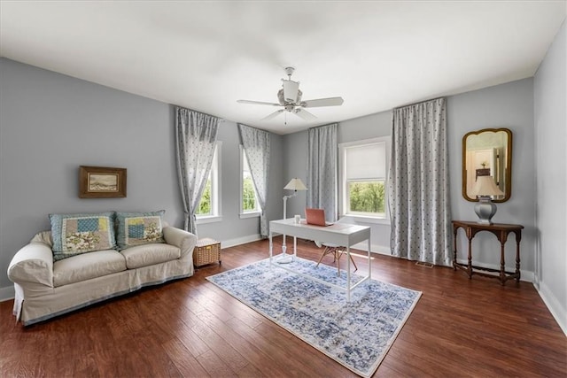 office with baseboards, ceiling fan, and wood finished floors