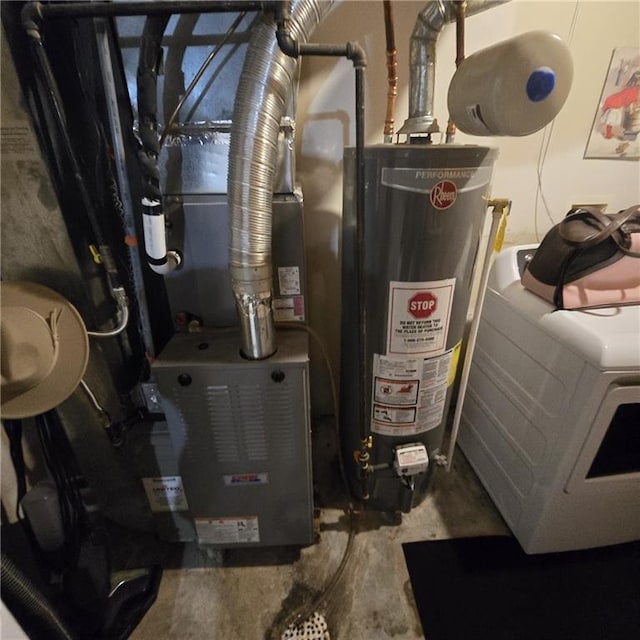 utilities with gas water heater and washer / clothes dryer