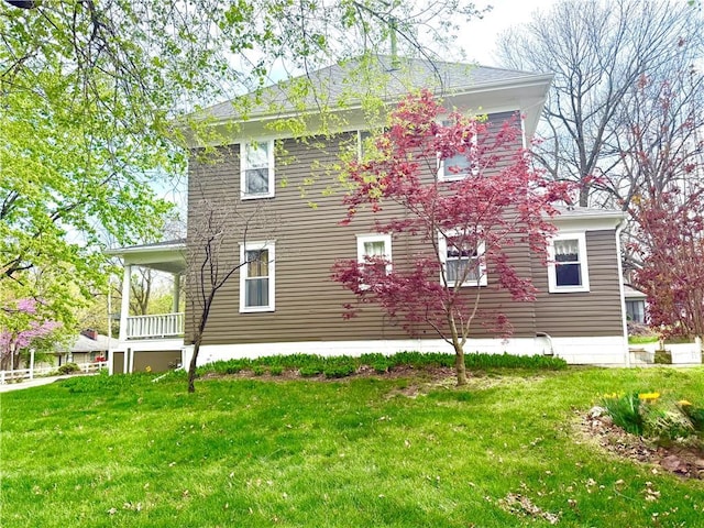 1420 N Mulberry St, Maryville, MO 64468 - view of home's exterior with a yard