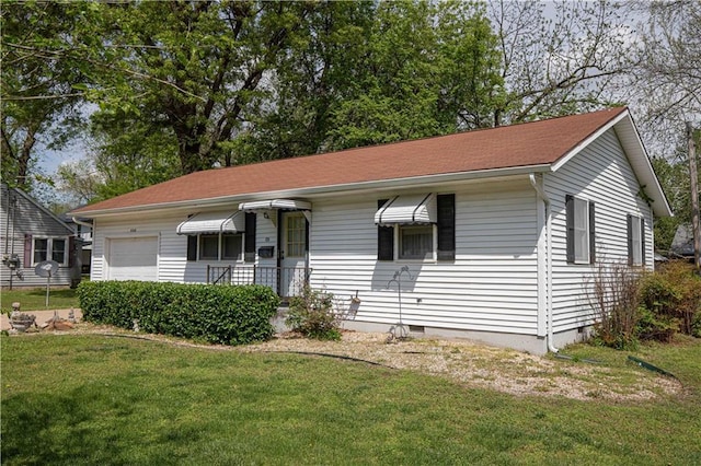 802 Cherry St, Lamar, MO 64759 - view of front facade featuring an attached garage, crawl space, and a front yard