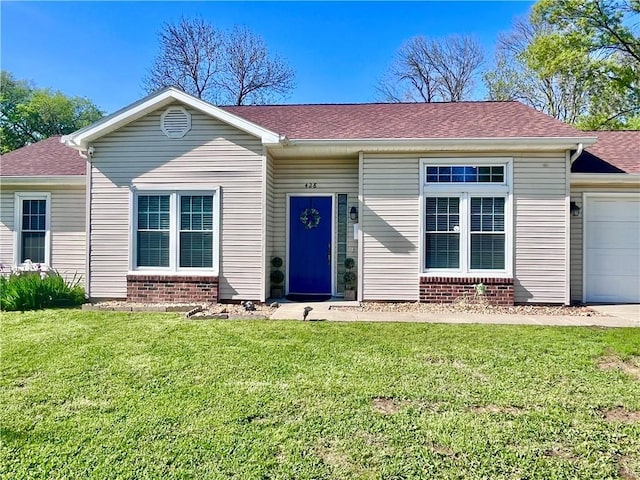 428 W Sycamore St, Nevada, MO 64772 - ranch-style house featuring brick siding, an attached garage, a front yard, and roof with shingles