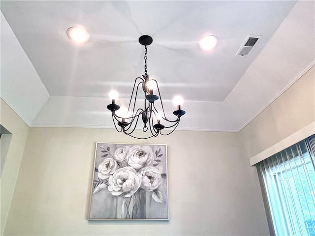 428 W Sycamore St, Nevada, MO 64772 - detailed view of a chandelier and crown molding