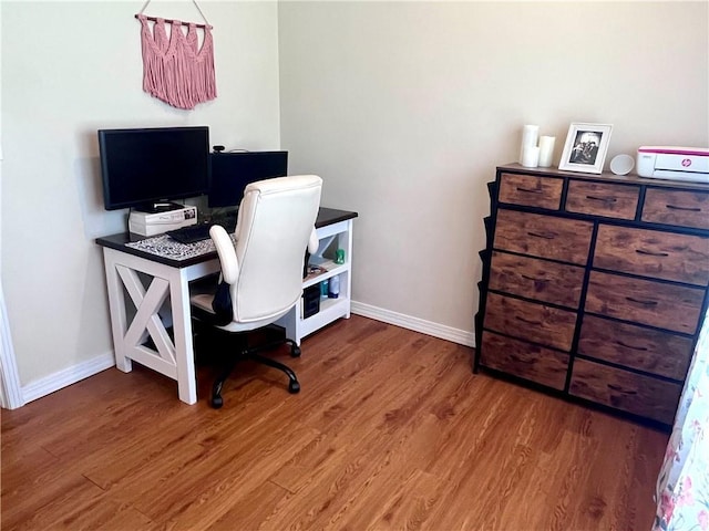 428 W Sycamore St, Nevada, MO 64772 - office area with wood finished floors and baseboards