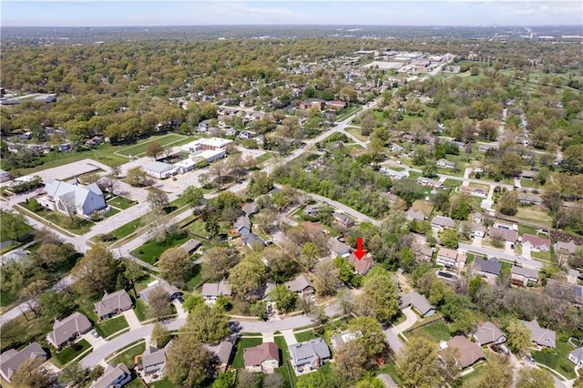 birds eye view of property with a residential view