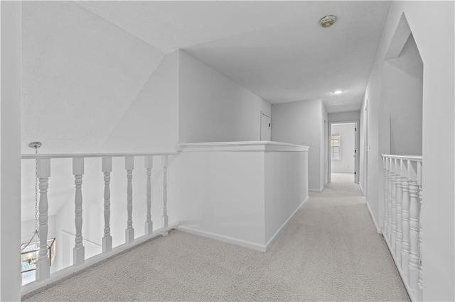 corridor featuring recessed lighting, baseboards, and carpet floors