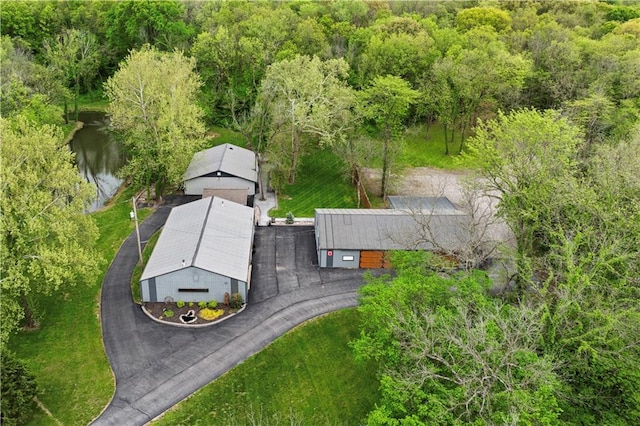 11155 Hubbard Rd, Kansas City, KS 66109 - aerial view of property and surrounding area featuring a nearby body of water and a forest