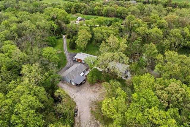 11155 Hubbard Rd, Kansas City, KS 66109 - view from above of property with a heavily wooded area