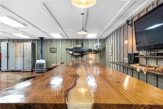 11155 Hubbard Rd, Kansas City, KS 66109 - dining room featuring a wood stove