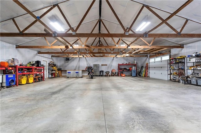 11155 Hubbard Rd, Kansas City, KS 66109 - garage featuring a workshop area