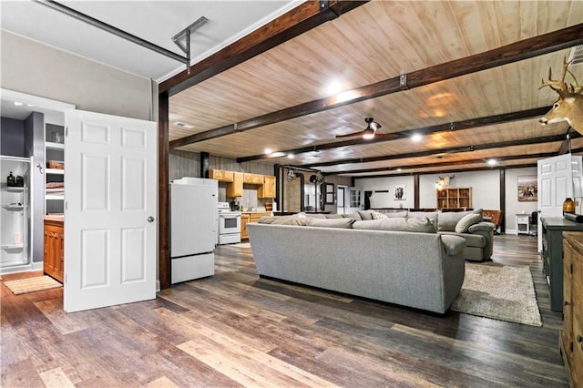 11155 Hubbard Rd, Kansas City, KS 66109 - living area with dark wood-style flooring and wood ceiling with exposed beams