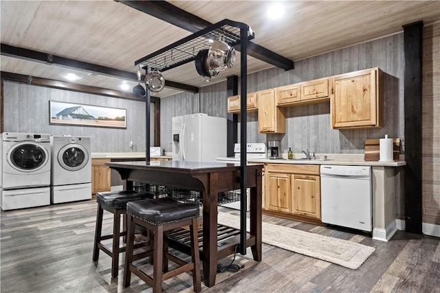 11155 Hubbard Rd, Kansas City, KS 66109 - kitchen with white appliances, independent washer and dryer, light brown cabinets, light countertops, and wooden ceiling with exposed beams