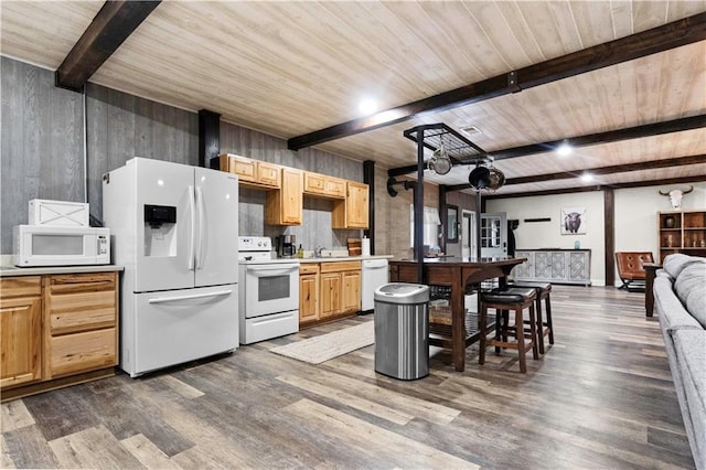 11155 Hubbard Rd, Kansas City, KS 66109 - kitchen with white appliances, wood ceiling with exposed beams, dark wood-style flooring, light countertops, and a sink