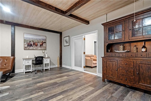 11155 Hubbard Rd, Kansas City, KS 66109 - home office with dark wood-type flooring, wooden ceiling with exposed beams, and baseboards