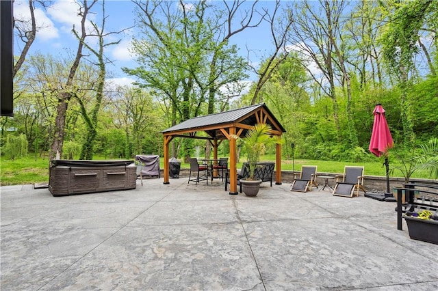 11155 Hubbard Rd, Kansas City, KS 66109 - view of home's community featuring a gazebo, a patio area, and a hot tub