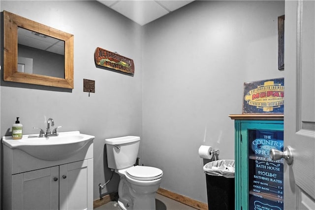 11155 Hubbard Rd, Kansas City, KS 66109 - bathroom featuring vanity, baseboards, and toilet