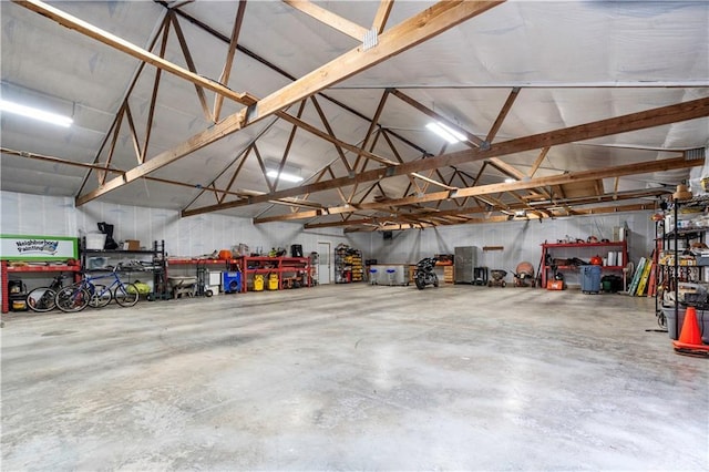 11155 Hubbard Rd, Kansas City, KS 66109 - garage featuring a workshop area