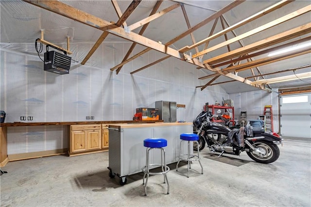 11155 Hubbard Rd, Kansas City, KS 66109 - garage featuring a heating unit