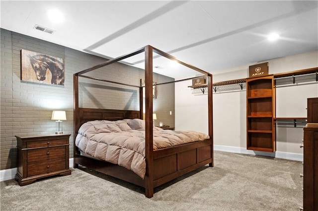 11155 Hubbard Rd, Kansas City, KS 66109 - bedroom featuring carpet, baseboards, and brick wall