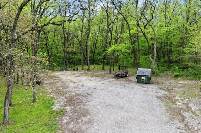 11155 Hubbard Rd, Kansas City, KS 66109 - view of street featuring a view of trees