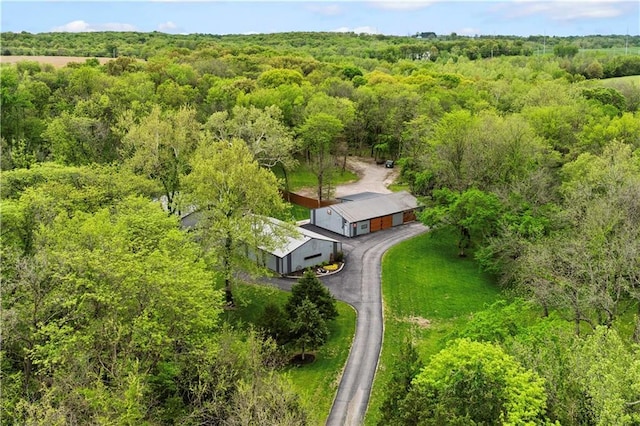 11155 Hubbard Rd, Kansas City, KS 66109 - view from above of property featuring a heavily wooded area