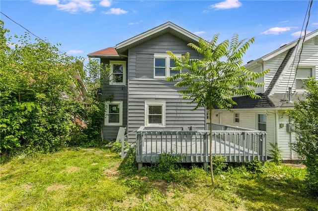 2219 E Meyer Blvd, Kansas City, MO 64132 - back of house with a wooden deck