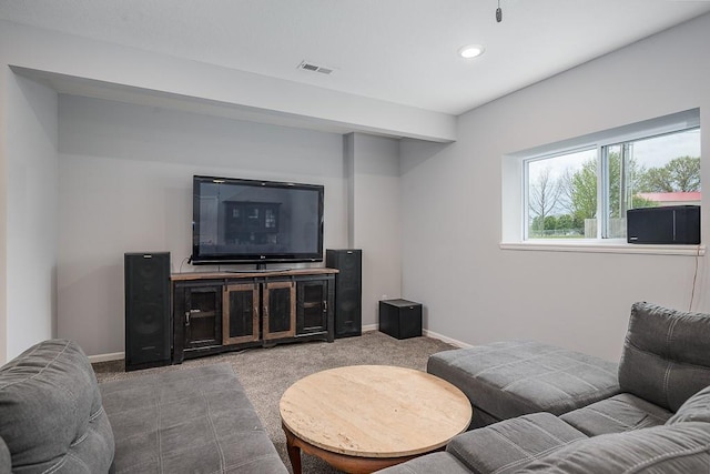 living area with recessed lighting, visible vents, carpet flooring, and baseboards