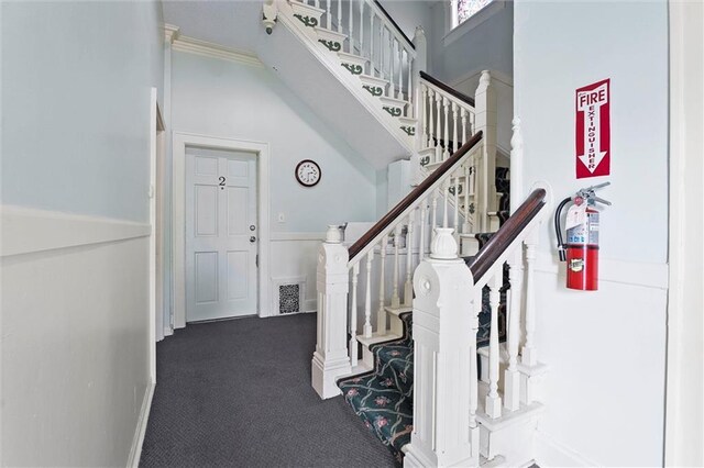 510 E Park St, Olathe, KS 66061 - entryway with carpet floors, stairs, and a high ceiling