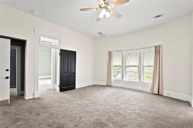 510 E Park St, Olathe, KS 66061 - unfurnished bedroom featuring carpet flooring and a ceiling fan