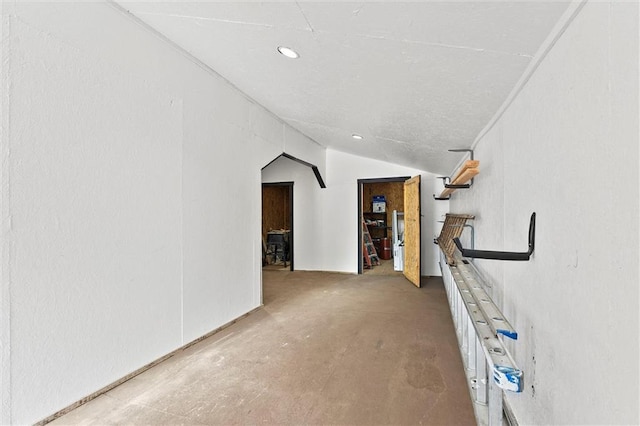510 E Park St, Olathe, KS 66061 - corridor featuring vaulted ceiling, recessed lighting, and arched walkways