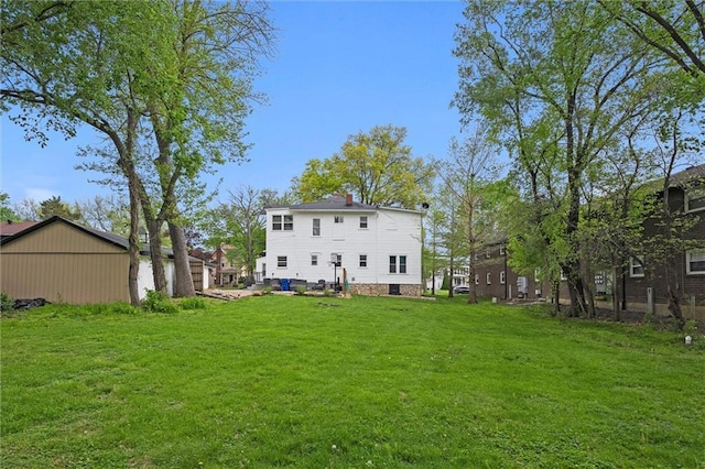 510 E Park St, Olathe, KS 66061 - back of property with a yard and a chimney