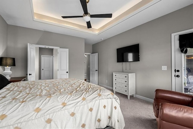21410 W 189th Ter, Spring Hill, KS 66083 - bedroom with carpet, a raised ceiling, baseboards, and a ceiling fan