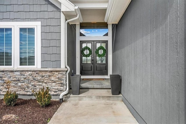 21410 W 189th Ter, Spring Hill, KS 66083 - view of exterior entry featuring french doors and stone siding