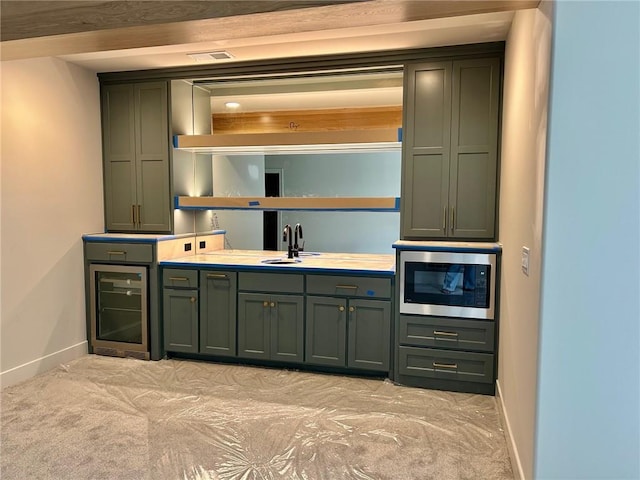 10303 W 151st Ter, Overland Park, KS 66221 - bar with beverage cooler, stainless steel microwave, and light carpet