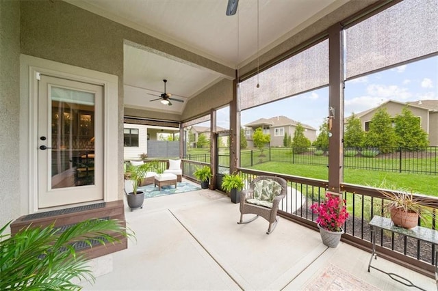 view of patio / terrace with ceiling fan and a porch
