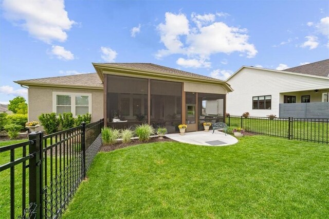 back of house with a sunroom, a patio, and stucco siding