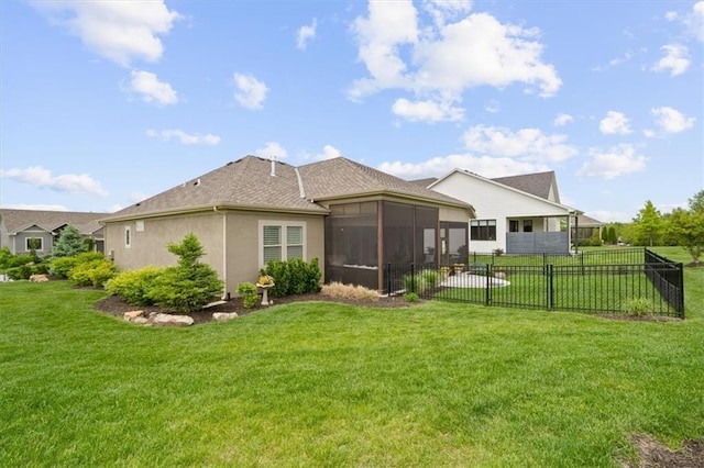 rear view of property featuring a sunroom and stucco siding