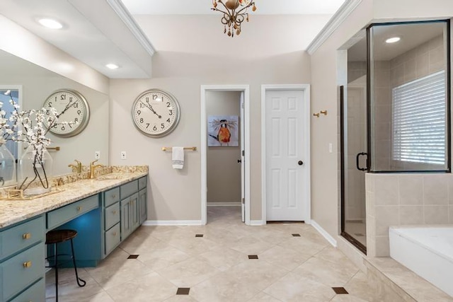 bathroom with double vanity, a bath, tile patterned floors, a sink, and a stall shower