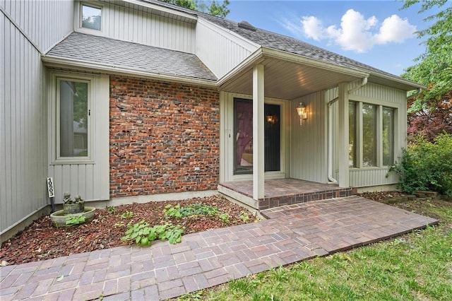 10503 W 50th Ter, Shawnee, KS 66203 - property entrance featuring roof with shingles